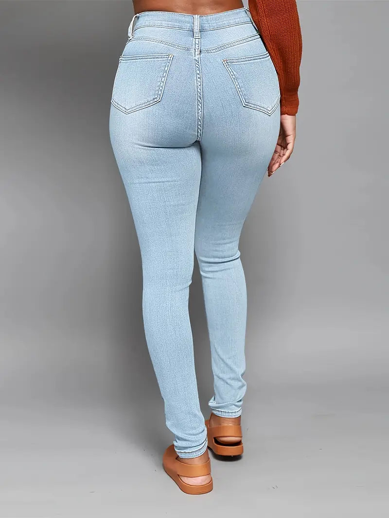 High Rise Ripped Skinny Jeans with Distressed Hem