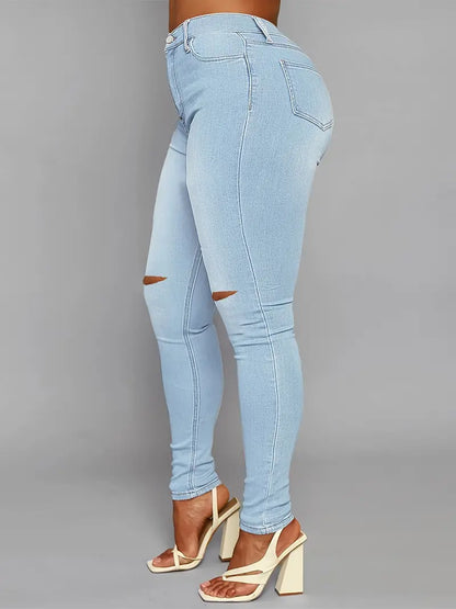 High Rise Ripped Skinny Jeans with Distressed Hem