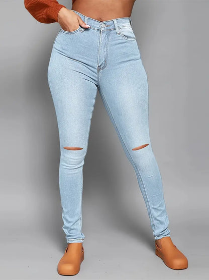 High Rise Ripped Skinny Jeans with Distressed Hem